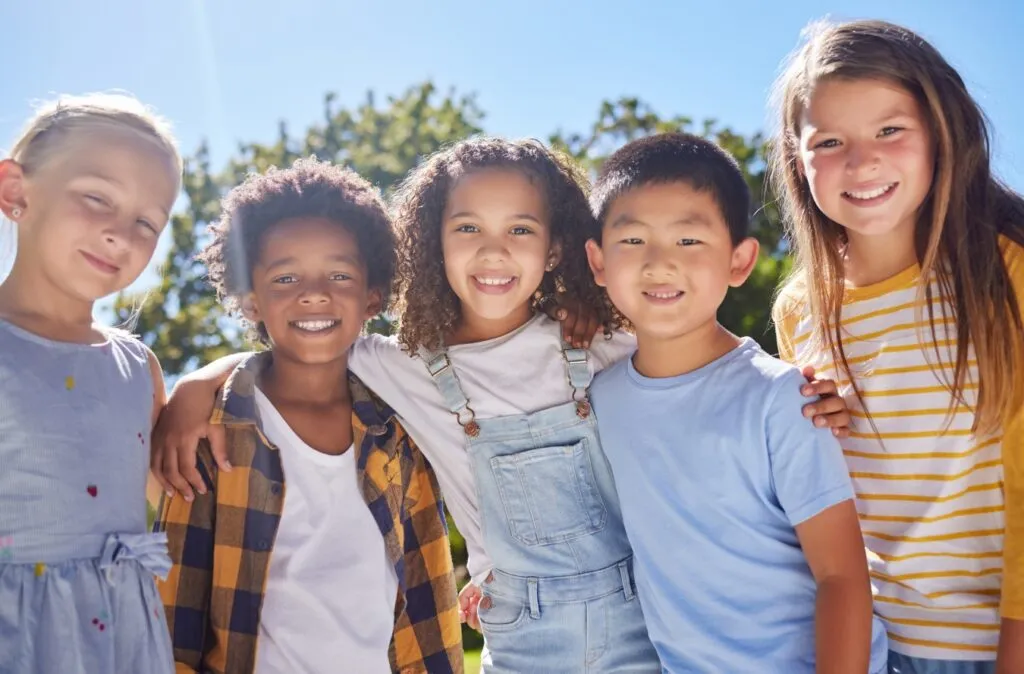 A group of children smiling